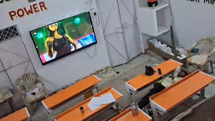 Mahoba Headmaster Found Lying Drunk with Songs Playing on TV BSA Takes Major Action