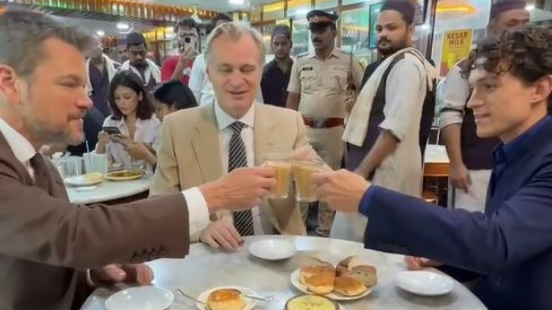 Tom Holland and christopher Nolan took tea break in mumbai before The Odyssey premier