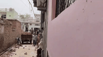 Two groups pelted bricks at each other over the construction of a wall in Jhajjar Haryana