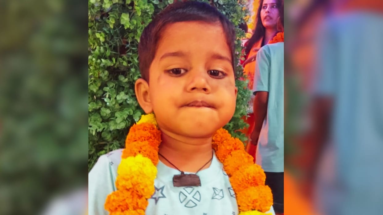 Varanasi Speeding bus runs over family motorcycle child killed three injured villagers block road