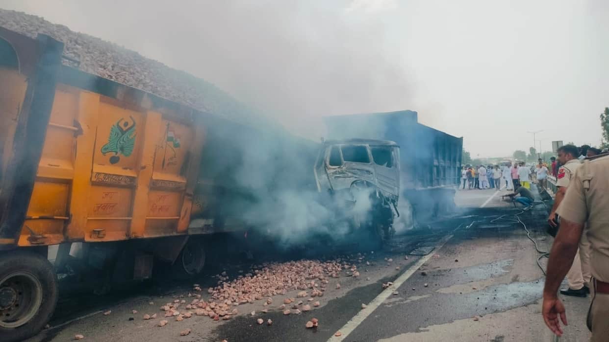 Driver Mangal Sen killed after two trailers collided violently and caught fire on NH-334B in Sonipat.