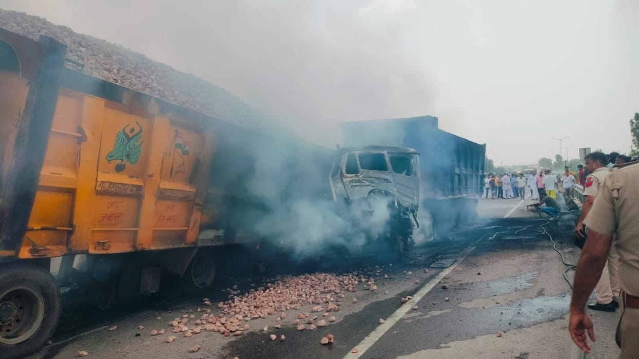 Driver Mangal Sen killed after two trailers collided violently and caught fire on NH-334B in Sonipat.