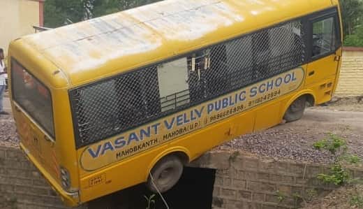 Mahoba School bus full of children left dangling from a culvert quick thinking by villagers saves 25 children