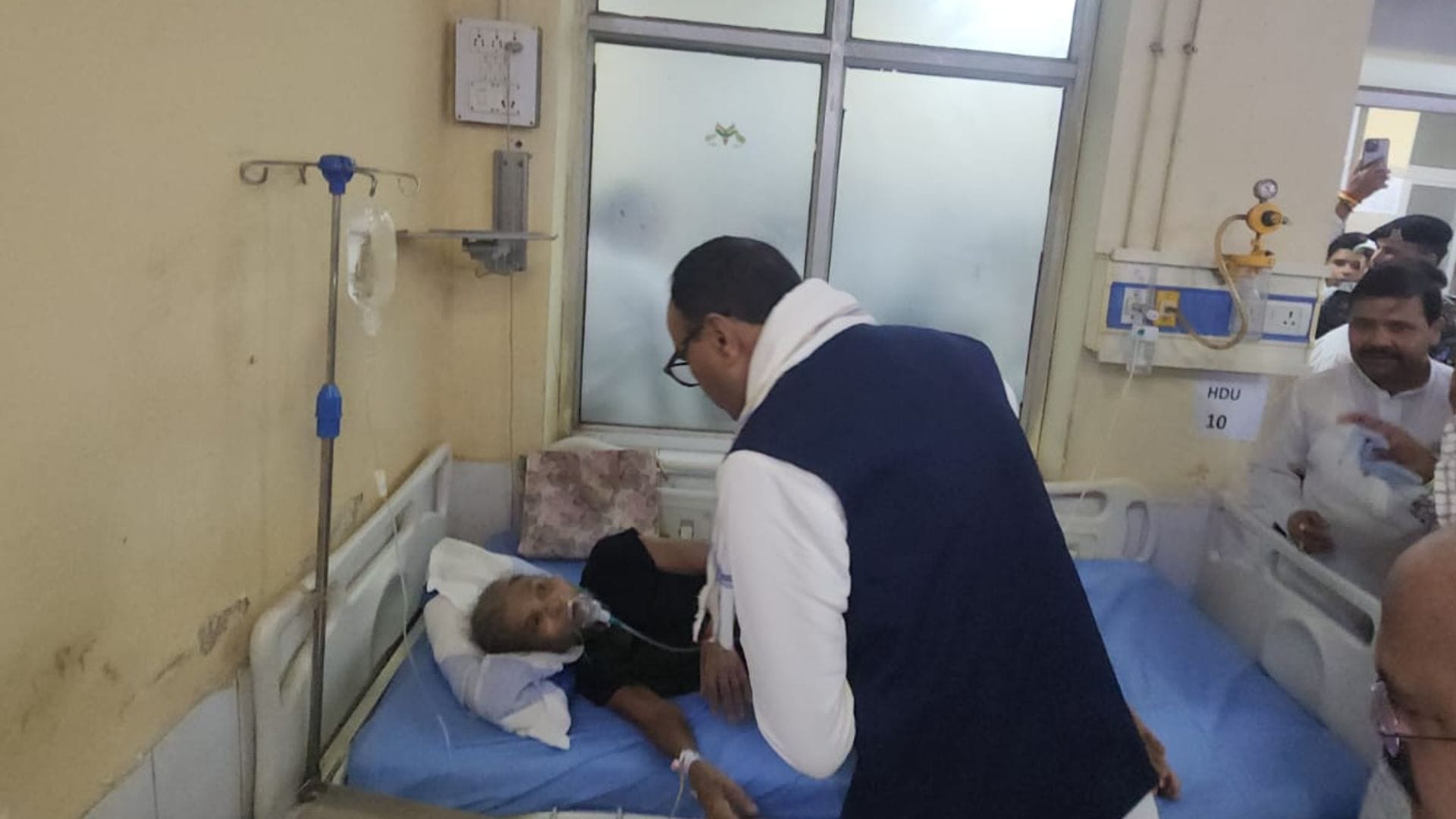 Deputy CM Brajesh Pathak Folded hands before woman and had patient bedsheet changed at hospital in Varanasi