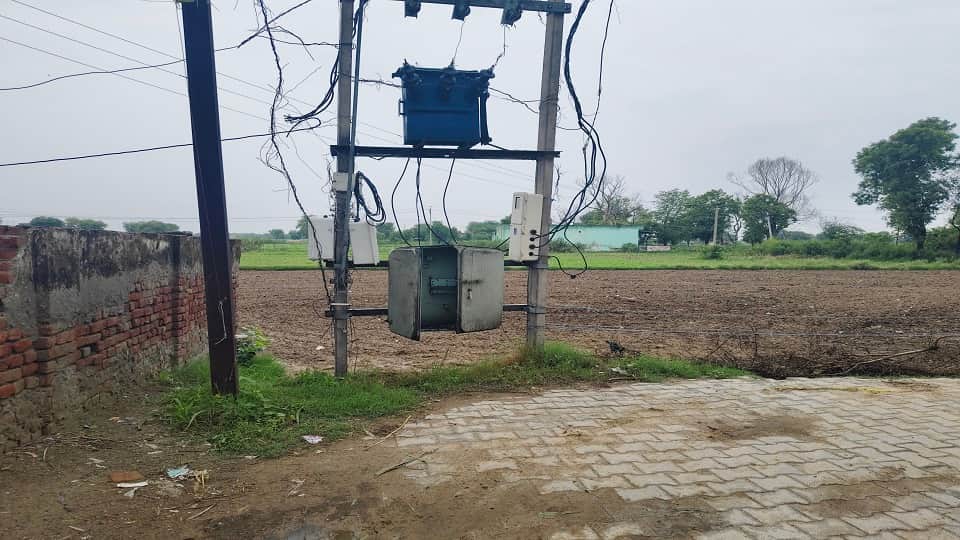 wires hanging below the transformer