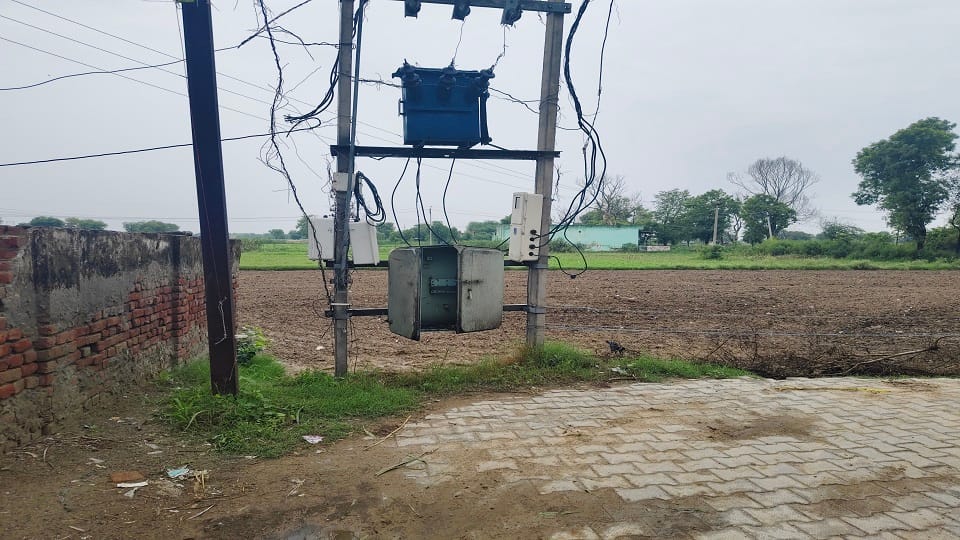 wires hanging below the transformer