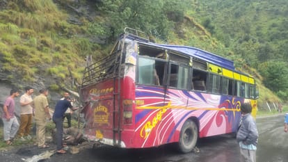 Boulder falls on moving bus; 2 dead, several injured.