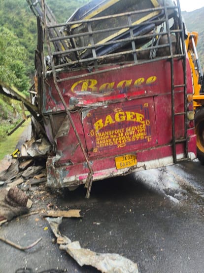 Boulder falls on moving bus; 2 dead, several injured.