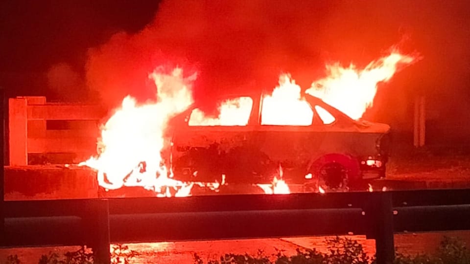 kanpur accident Car catches fire after hitting divider on Kanpur-Etawah Highway