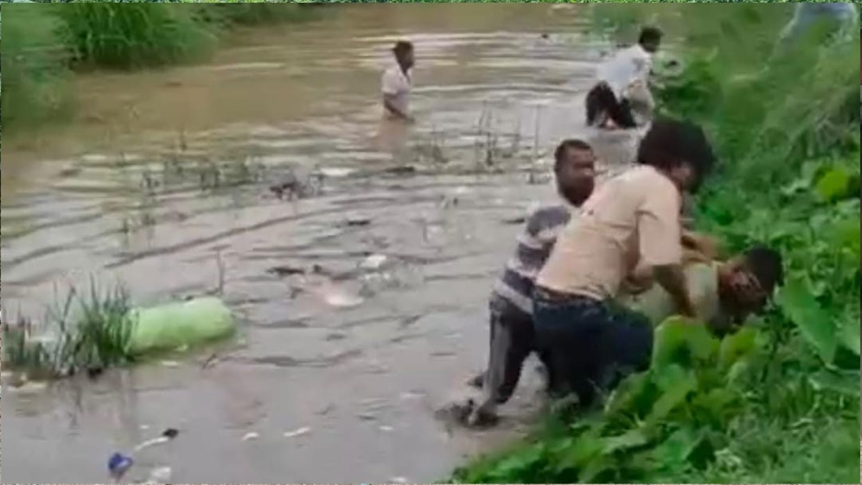 Video of a young man being beaten in a canal in Maharajganj goes viral.