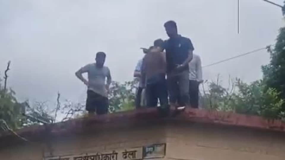 man climbed onto the roof of a forest outpost carrying petrol in corbett