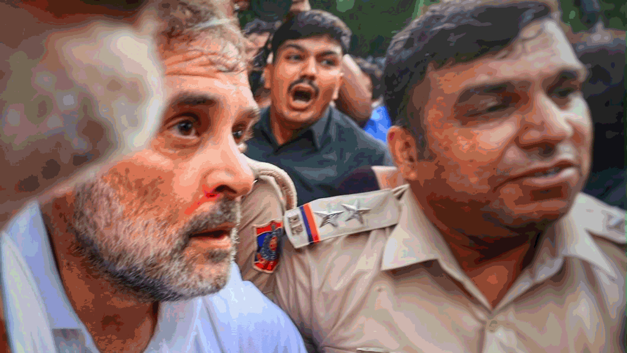PM residence Congress protest Police remove Rahul Gandhi from site blood seen from nose in picture Videos