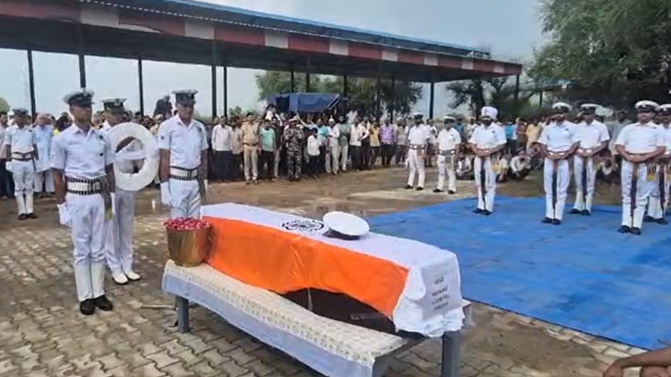 Navy personnel Ravikant was accorded a final farewell with military honors in Kanina Mahendragarh