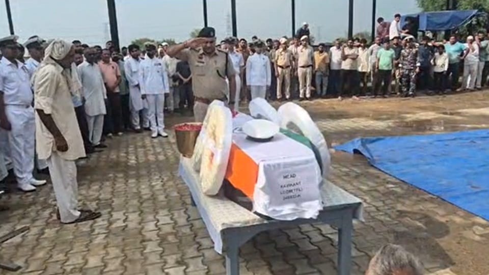 Navy personnel Ravikant was accorded a final farewell with military honors in Kanina Mahendragarh