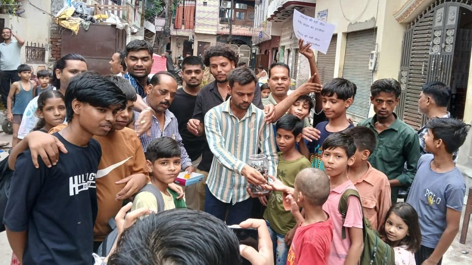 Laddus and Melody toffees distributed over Education Minister Dharmendra Pradhan resignation in agra