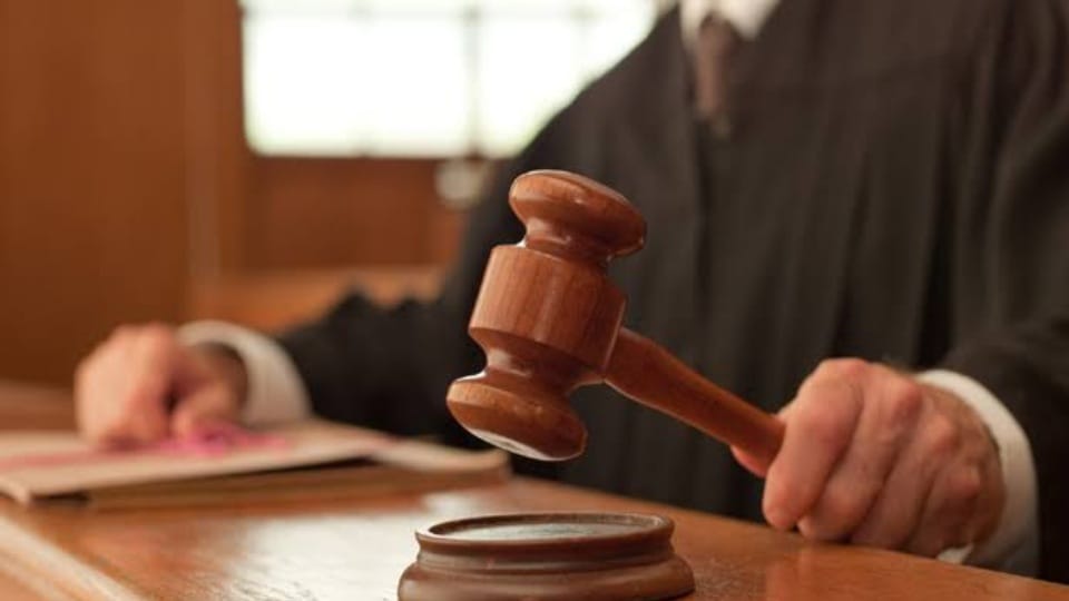 Lawsuit, charge sheet, and summons order quashed in cremation ground land dispute.