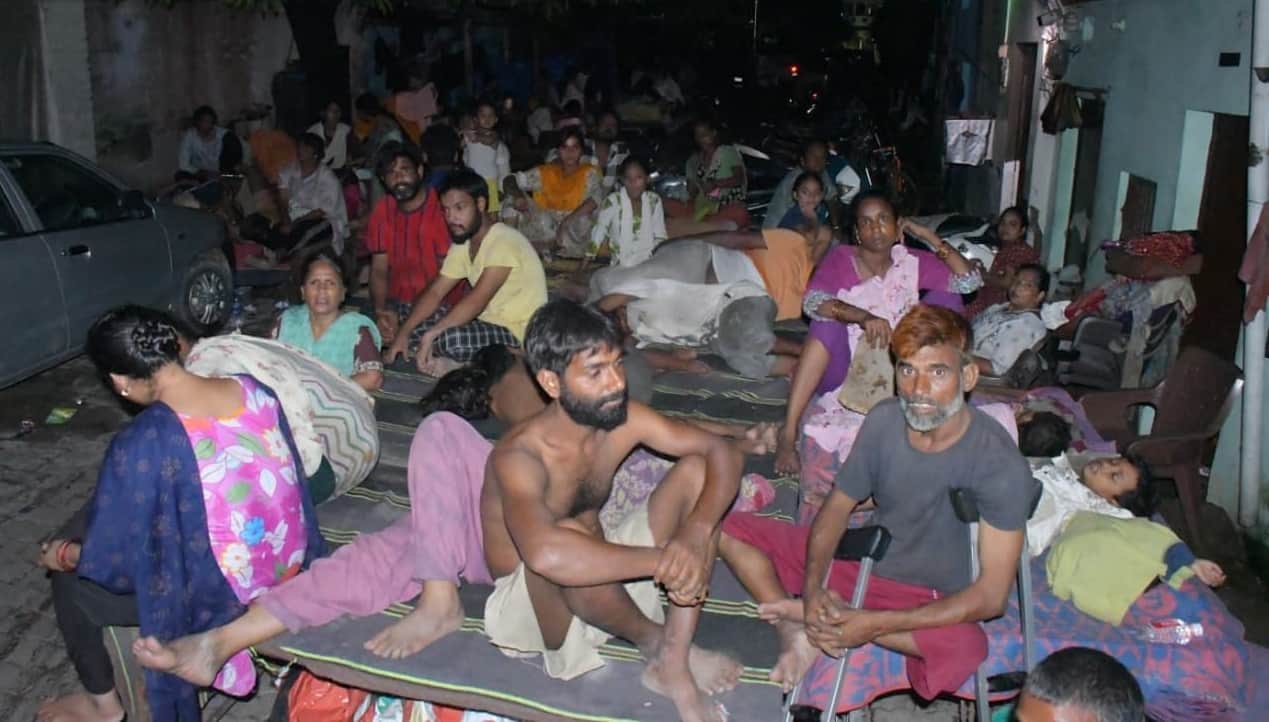 Kanpur Rain and waterlogging in Jajmau Two hours of rain destroy homes waistdeep water collapsing houses