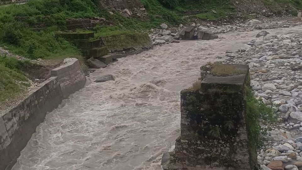 floodwaters of the Mandakini River have caused the security wall to collapse in Bhaurabgarh village