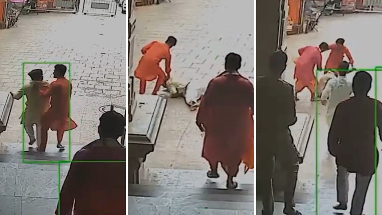 Priest drags companion inside Vindhyavasini Temple main gate beating him collar and slams him ground