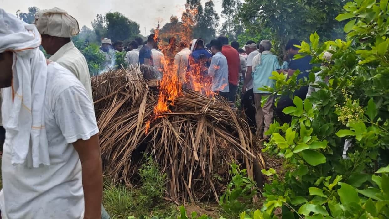 Gautam Murder Case Last rites performed amidst tight security bulldozers may be used on the accused's homes