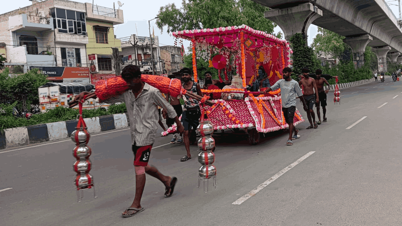 sea of Shiva devotees Delhi-Meerut Road Upper Ganga Canal towpath in Muradnagar photos sawan 2026