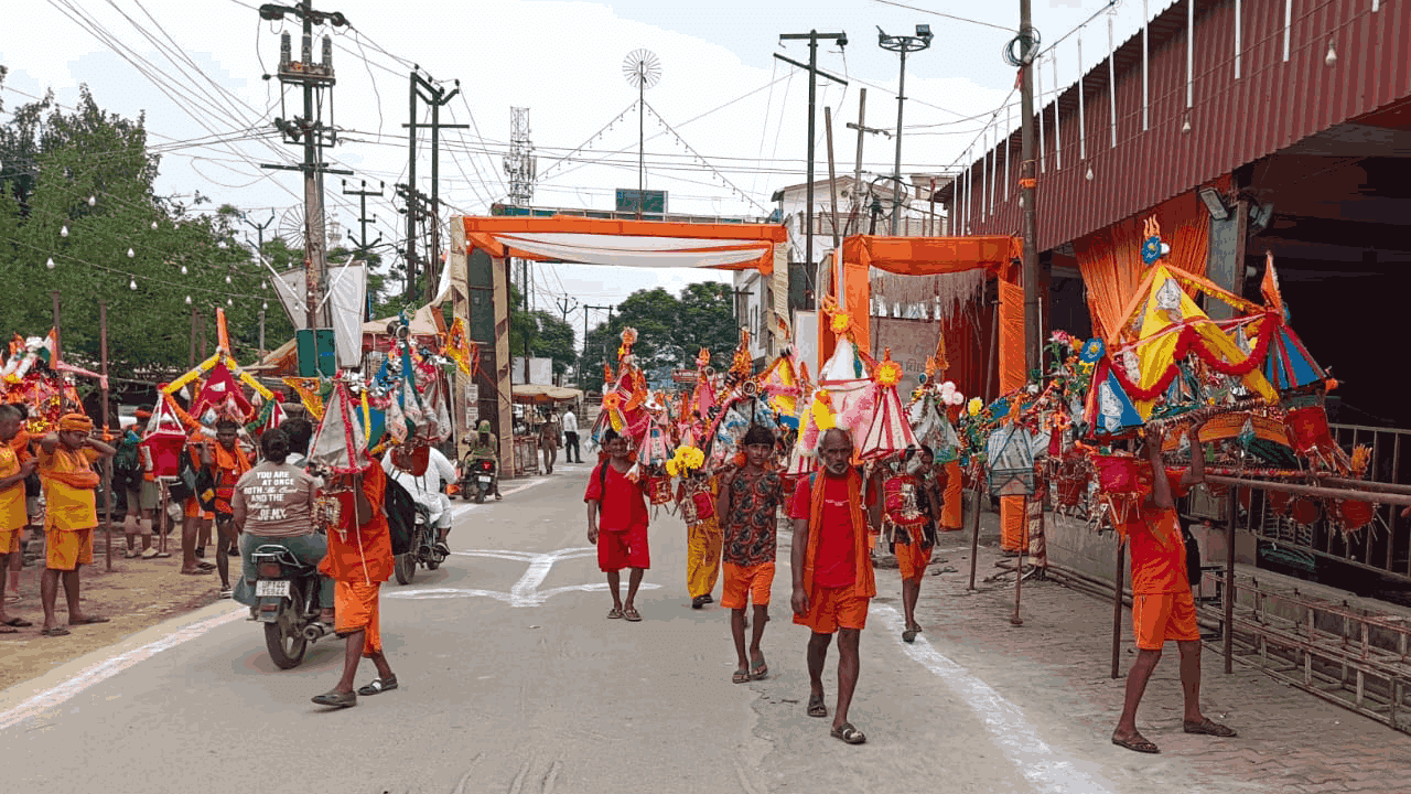 sea of Shiva devotees Delhi-Meerut Road Upper Ganga Canal towpath in Muradnagar photos sawan 2026