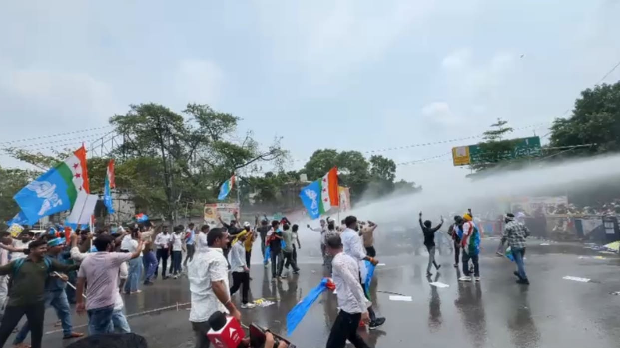 bihar Students March to CM Residence Break Barricades Police Use Water Cannons to Disperse Protesters in patna