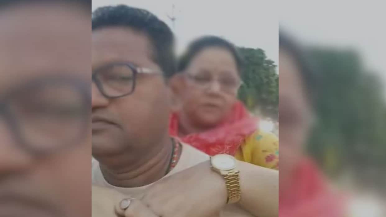 BJP councilor anger after video kissing woman goes viral claims relationship like that sister in varanasi