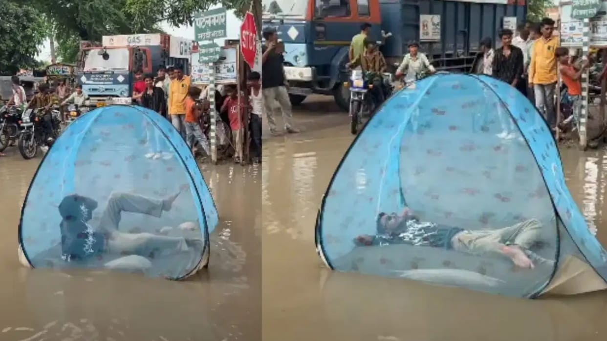 Man Sets Up a Bed on Waterlogged Road and Sleeps Under a Mosquito Net, Viral Video Stuns Internet