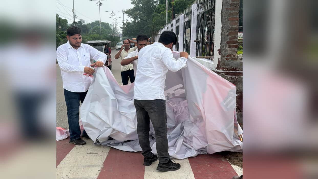 Congress leaders tore down posters put up against Rahul Gandhi in the city