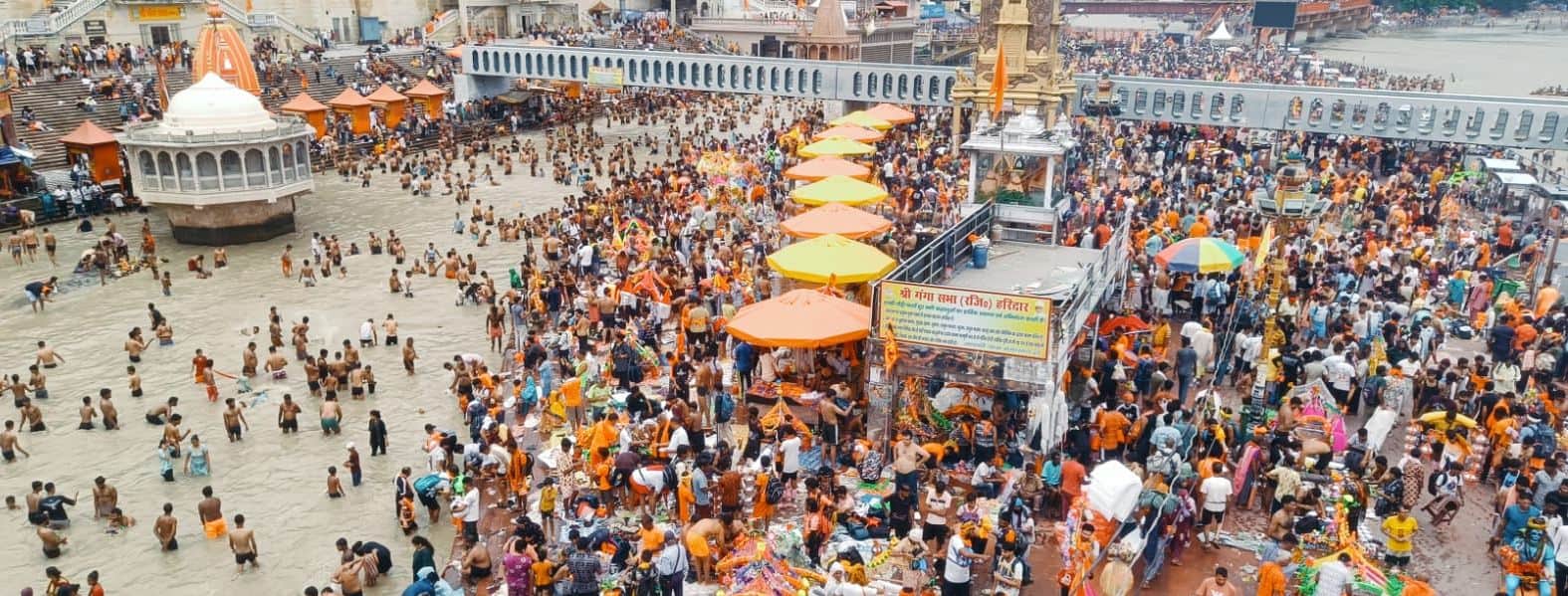 Kanwar Yatra 2026 millions Devotees take Gangajal from haridwar Har Ki Pauri Photos