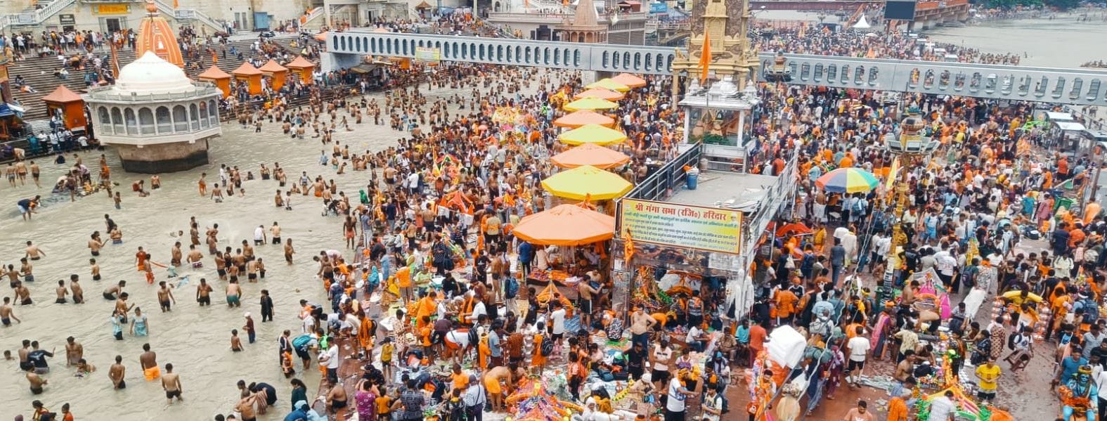 Kanwar Yatra 2026 millions Devotees take Gangajal from haridwar Har Ki Pauri Photos
