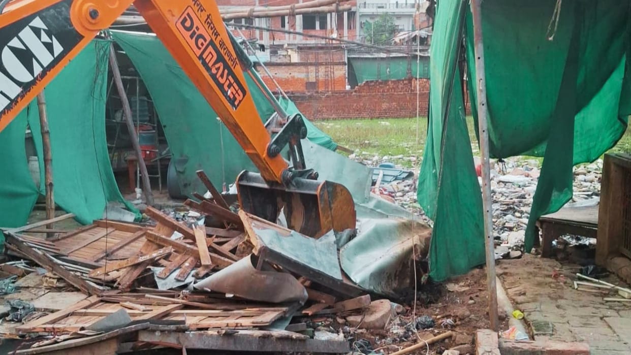 The municipal corporation demolished 12 meat shops in Awaleshpur using a JCB and confiscatedmesh screens.