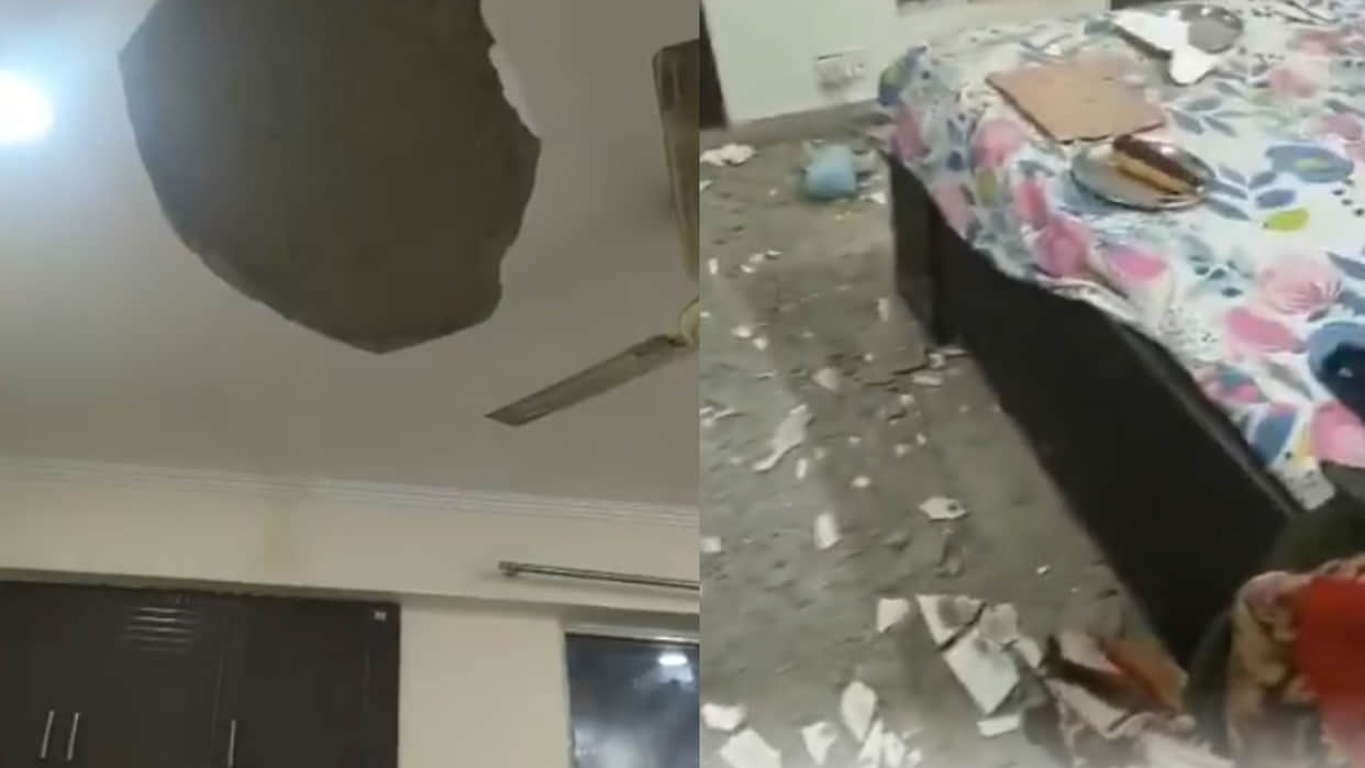 Greater noida west ceiling plaster falls child standing below narrowly escapes viral video