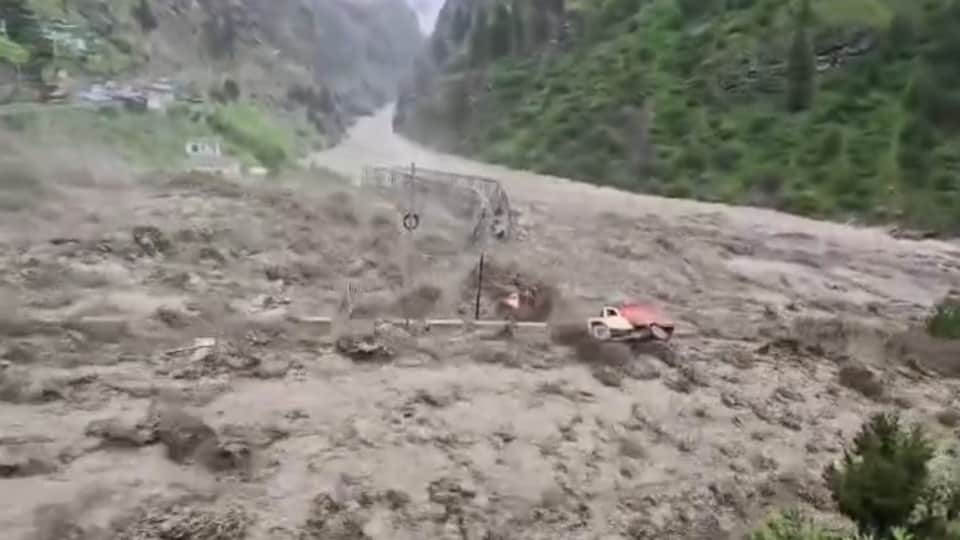 Uttarakhand Chamoli extreme Rainfall China border Bridge collapse in seconds vehicle swept away Photos