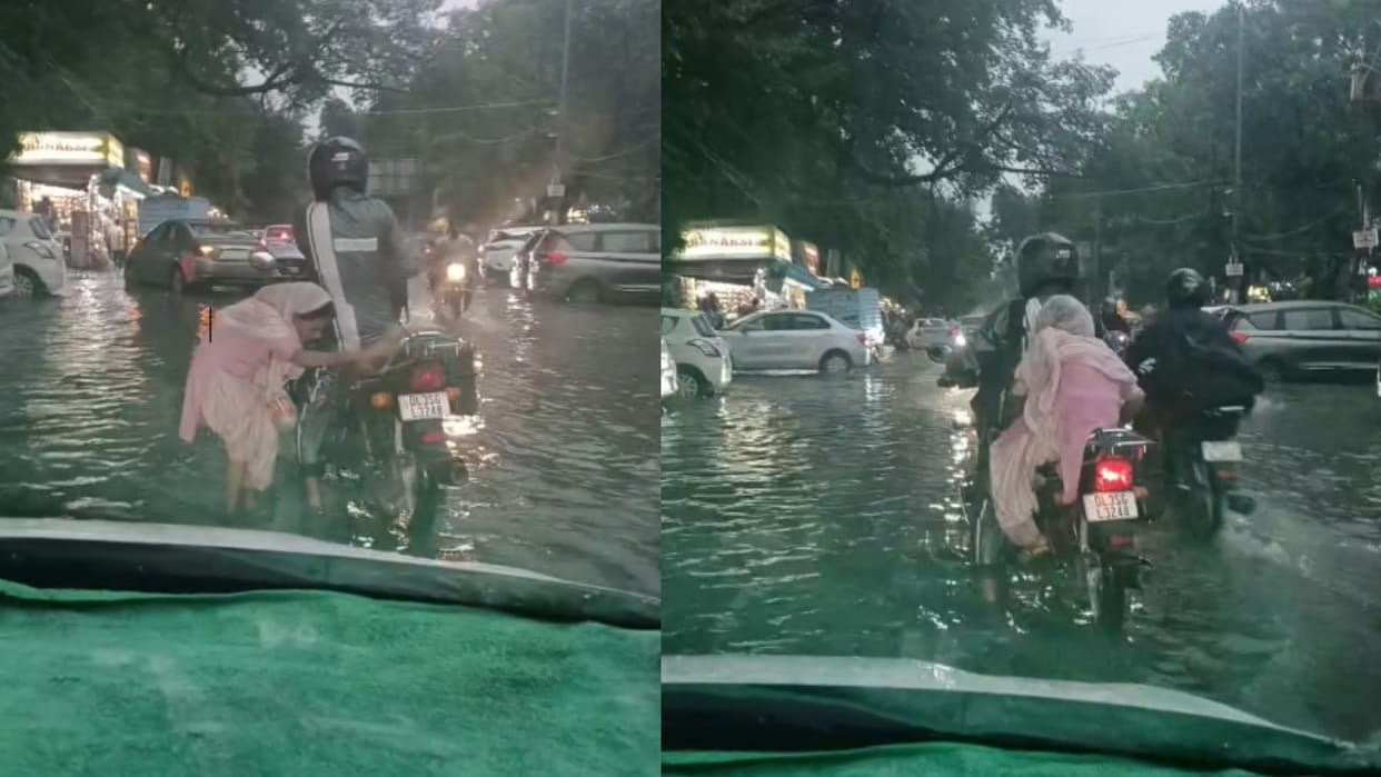 Delhi biker helps elderly woman on waterlogged road video goes viral on internet