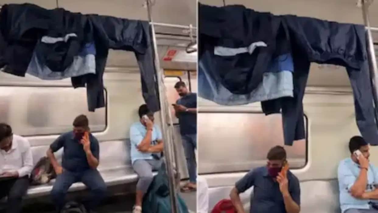 Delhi Metro Turns Into a Makeshift Clothesline as Passenger Hangs Wet Clothes Inside Coach