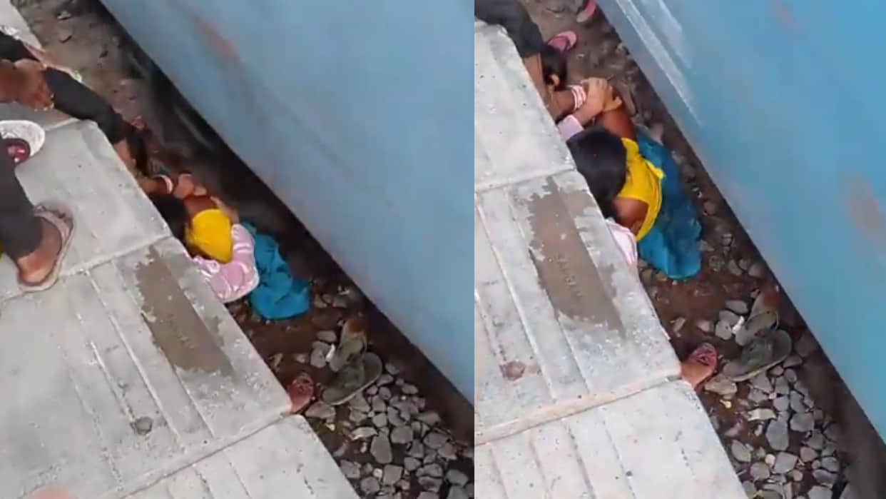 Mother protects children as train passes video goes viral on social media