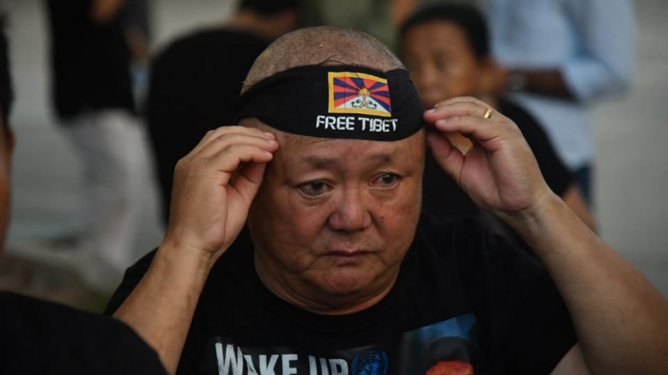 Tibet anguish visible in Chandigarh 200 Tibetans take to streets in black attire Lobga gave his life