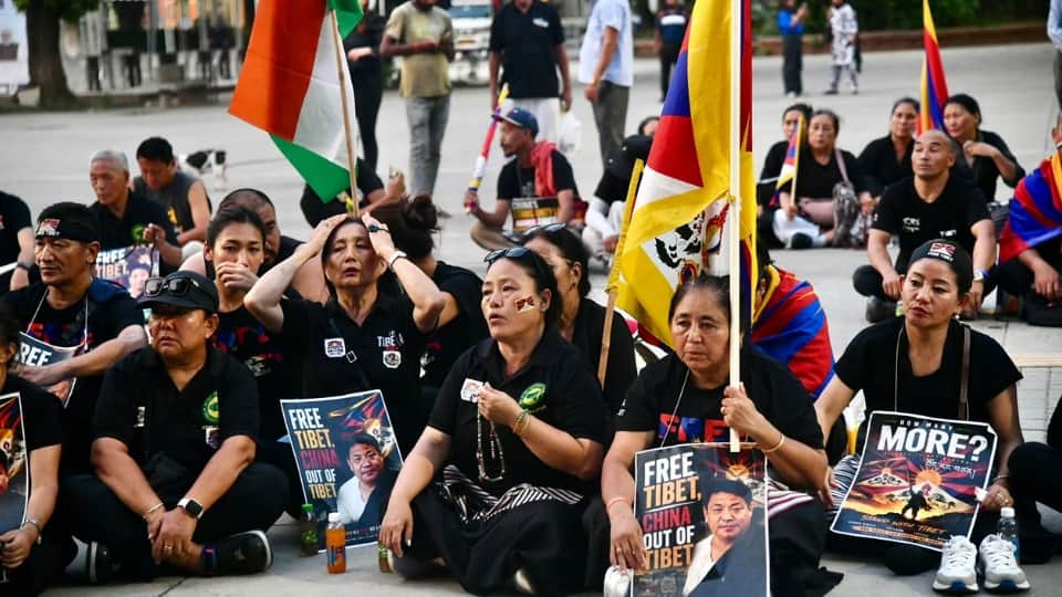 Tibet anguish visible in Chandigarh 200 Tibetans take to streets in black attire Lobga gave his life