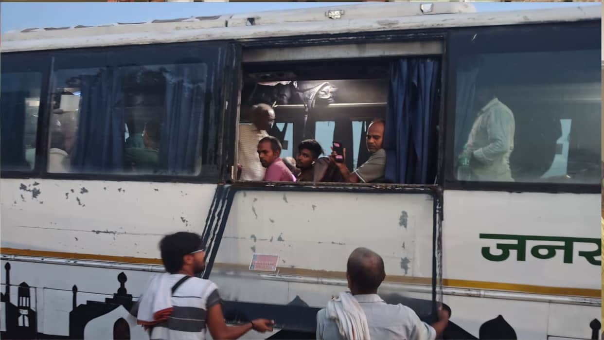 The bus remained stalled between the tracks at the Nandanagar railway crossing for about ten minutes.