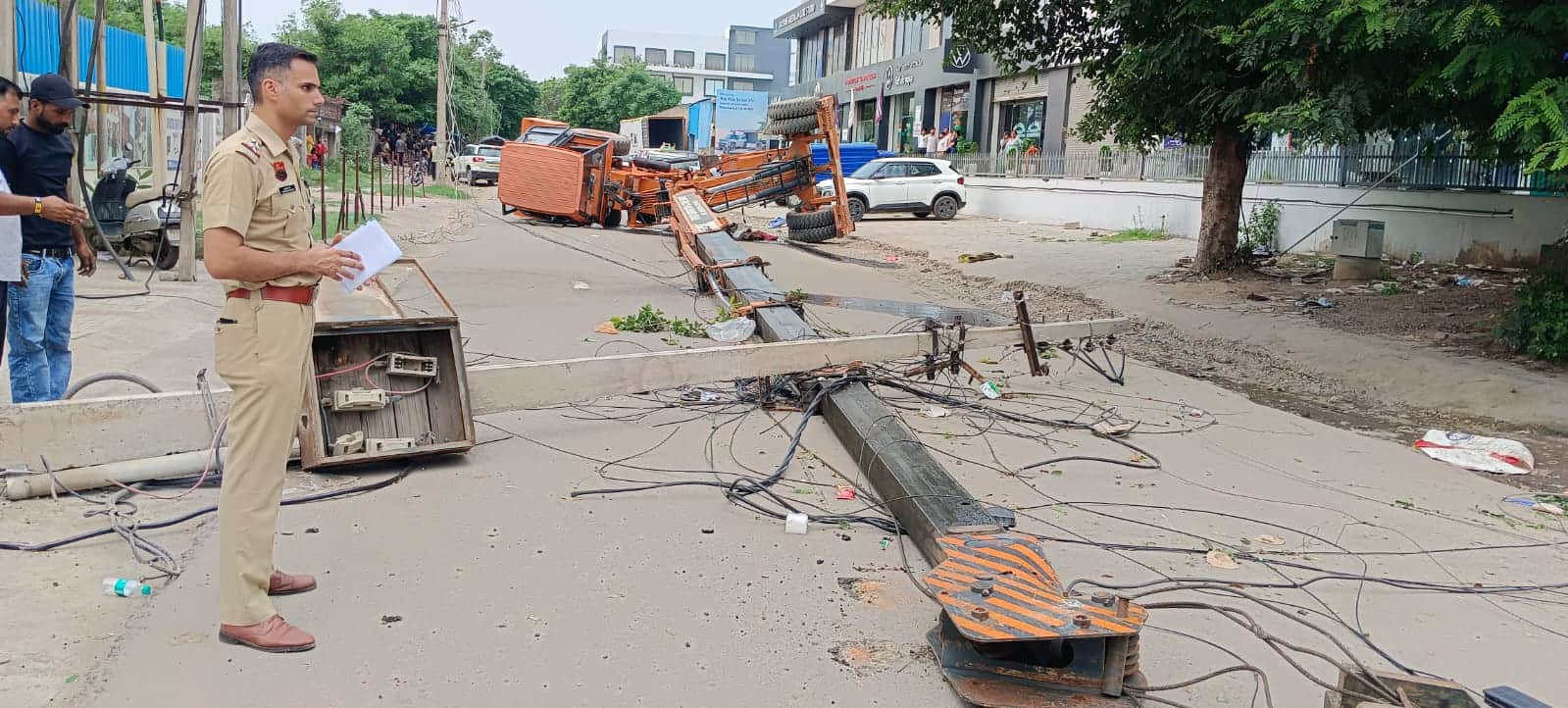Crane overturns in Panchkula two people die after falling from fourth floor along with generator