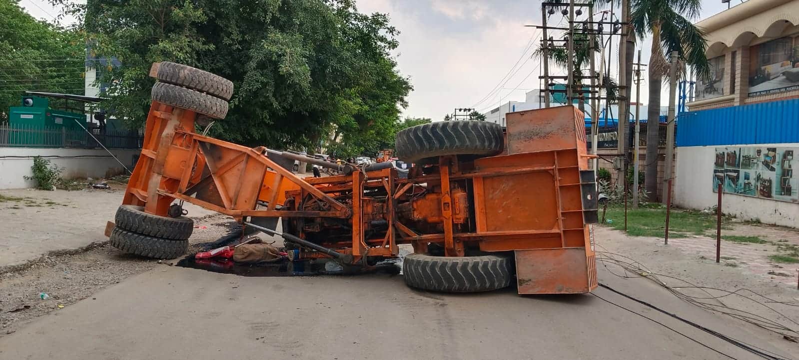 Crane overturns in Panchkula two people die after falling from fourth floor along with generator