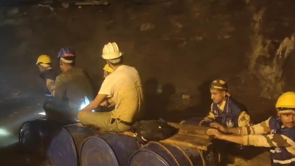 Chamoli Tunnel Landslide Half tunnel filled with water and debris up to neck level Soldiers rescue using drums