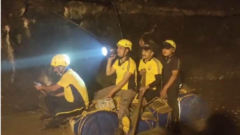 Chamoli Tunnel Landslide Half tunnel filled with water and debris up to neck level Soldiers rescue using drums
