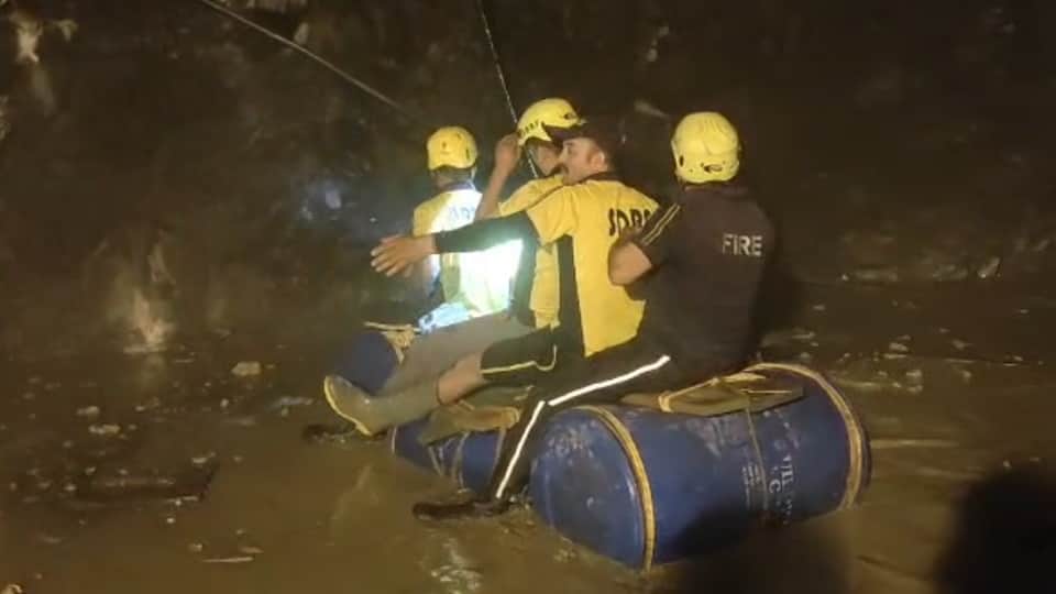 Chamoli Tunnel Landslide Half tunnel filled with water and debris up to neck level Soldiers rescue using drums