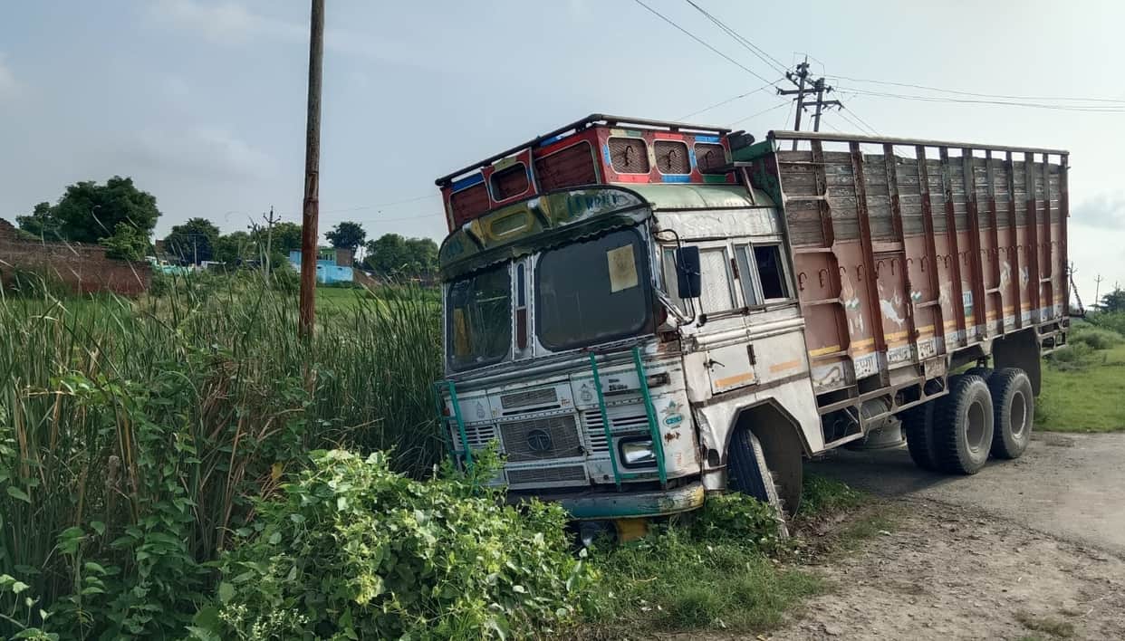 Auraiya Out of control truck overturns into ditch accident caused by steering failure driver crushed to death