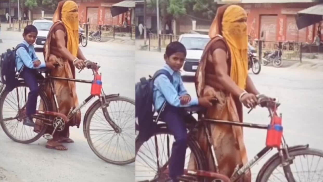 viral mother takes child to school on bicycle heartwarming mothers love sacrifice inspiring video