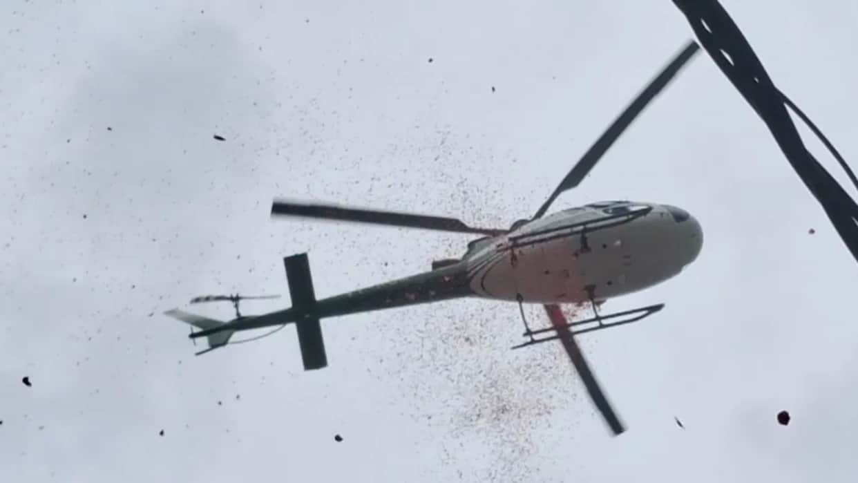 spectacular sight in baba garibnath flowers showered upon shiva devotees by helicopter