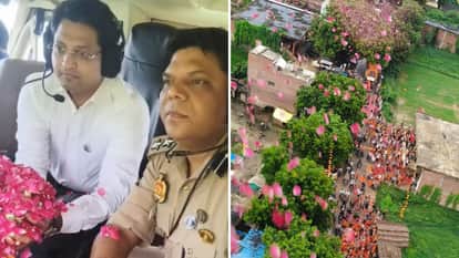 बारिश के बीच कांवड़ियों पर हेलीकॉप्टर से पुष्पवर्षा।